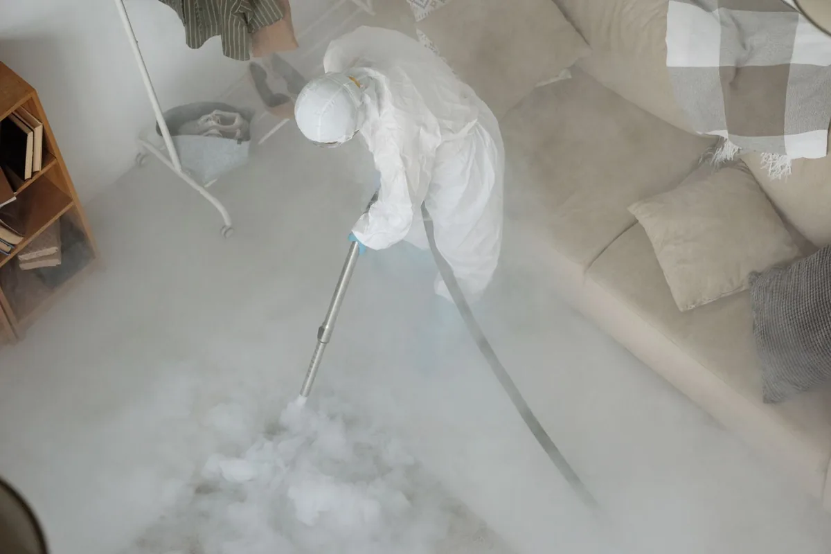 Biohazard cleanup technician in protective equipment, Worcester, NY